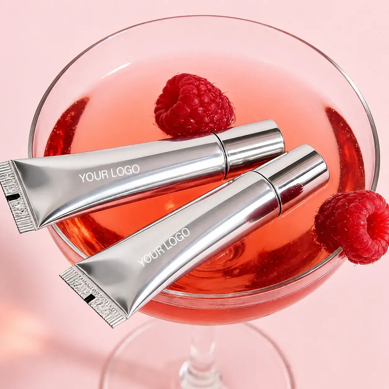 Aluminum lip gloss squeeze tube containers with silver caps and custom logo area for beauty brands