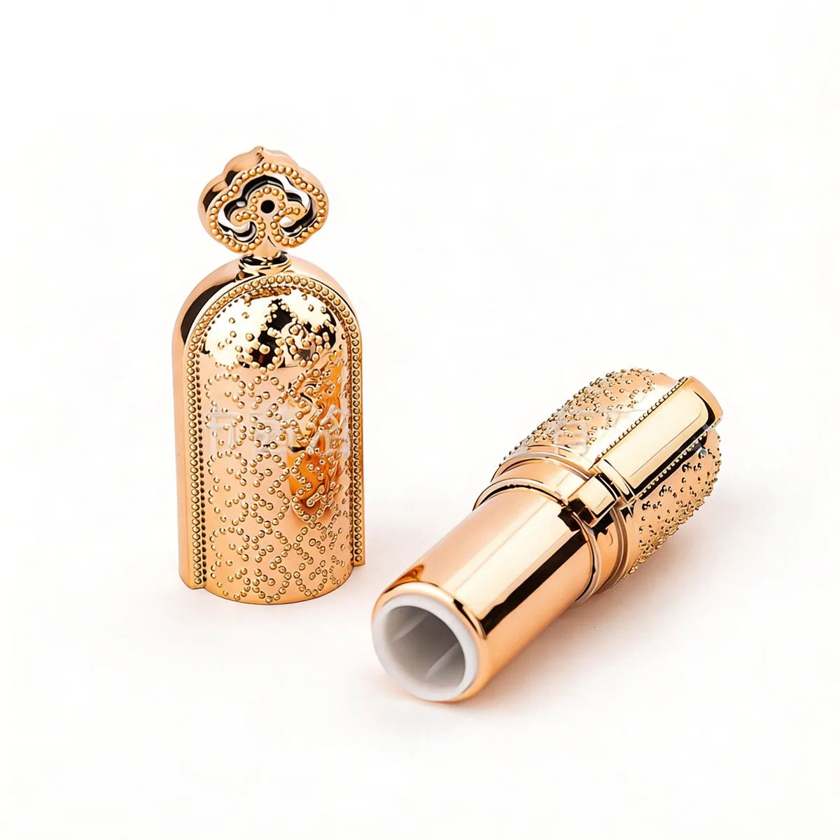 Luxury lipstick packaging in an embossed gold design by KAIYA