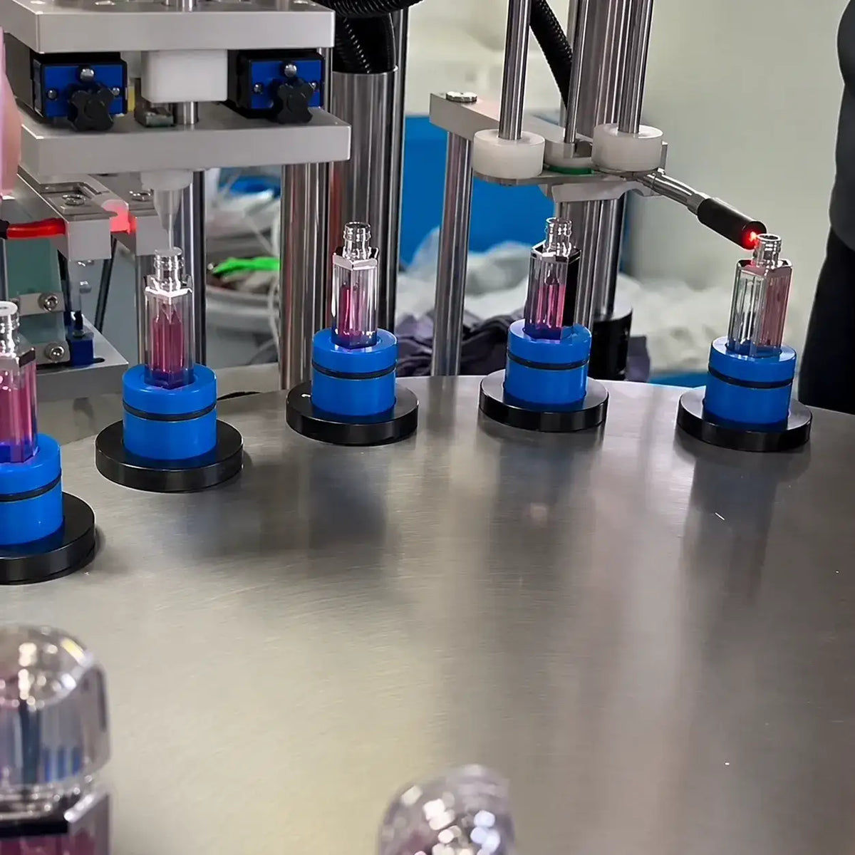Makeup manufacturer KAIYA showing tube filling equipment for finished color makeup production and bulk makeup orders