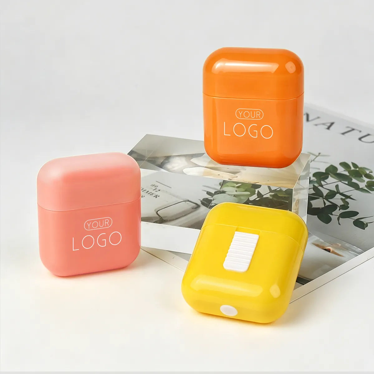 Sunblock container in colorful stick packaging with pink, orange, and yellow custom sunscreen designs