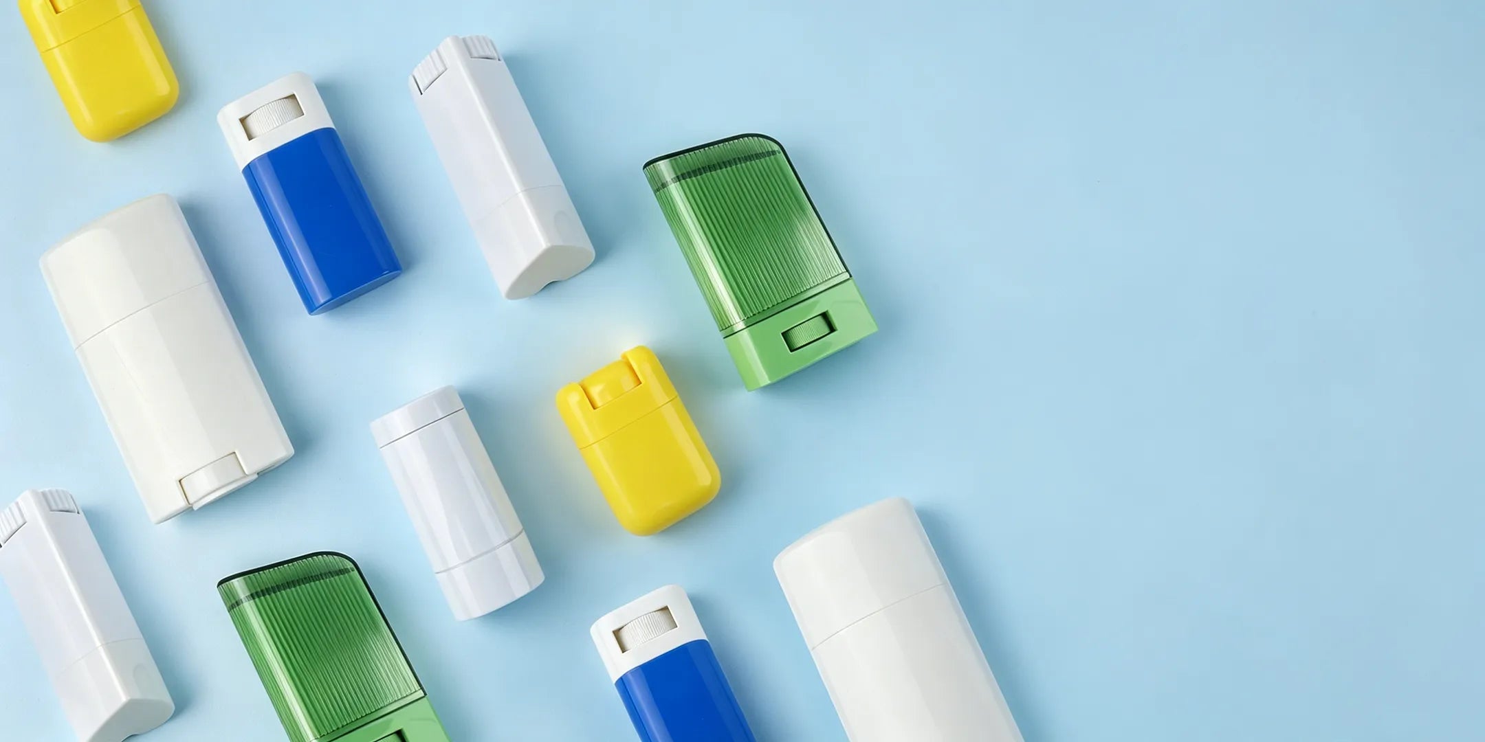 Kaiya sunscreen packaging collection with empty sunscreen containers and stick packaging designs in multiple colors for cosmetic packaging projects.